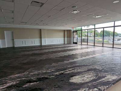 View of the south half of the hall from the kitchen 