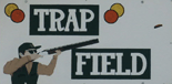 White sign with an illustration of male Caucasian hunter with a vest & hat on shooting a rifle at skeet. Reads "Trap and Field"